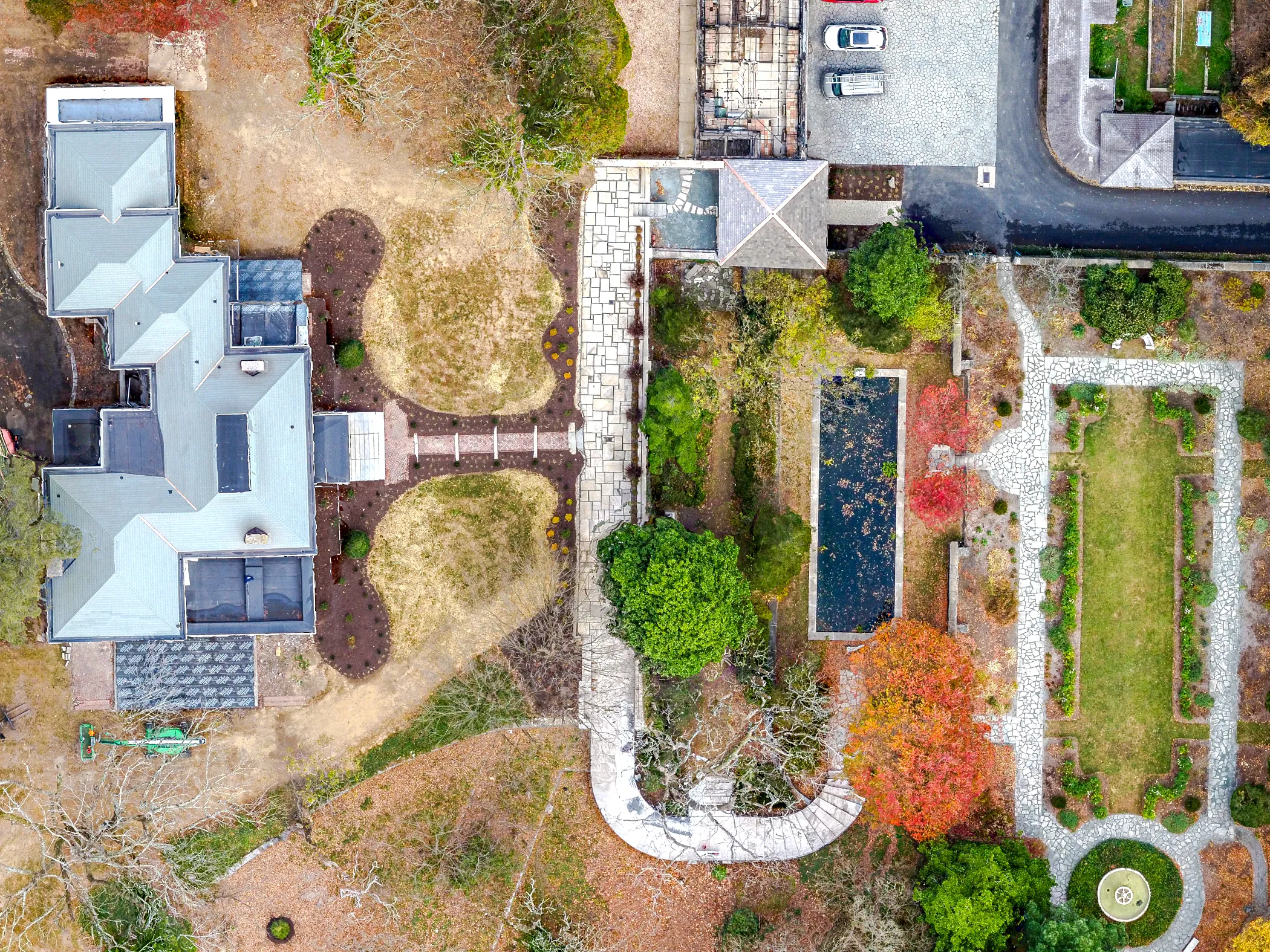 Straight-down aerial view of Gibraltar Estate showing the marble promenade axis, reflecting pool, formal garden parterres, and outbuildings in autumn color, Wilmington, DE
